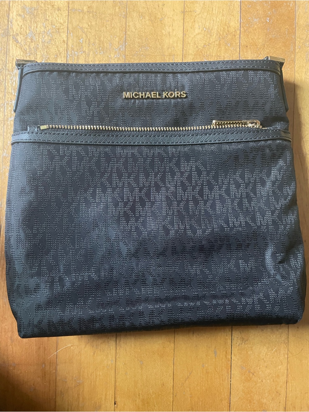 Michael Kors Black and Gold Monogram crossbody bag